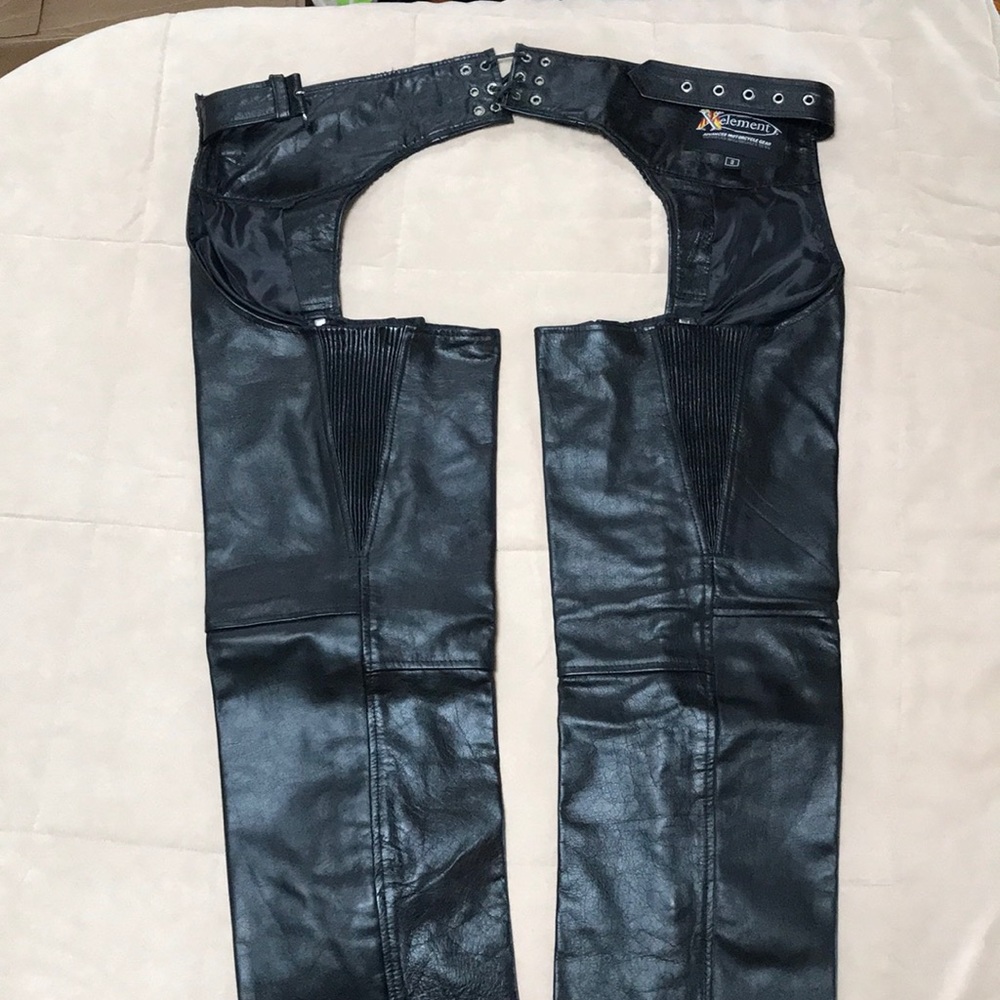 Black, women's leather chaps with braid detail